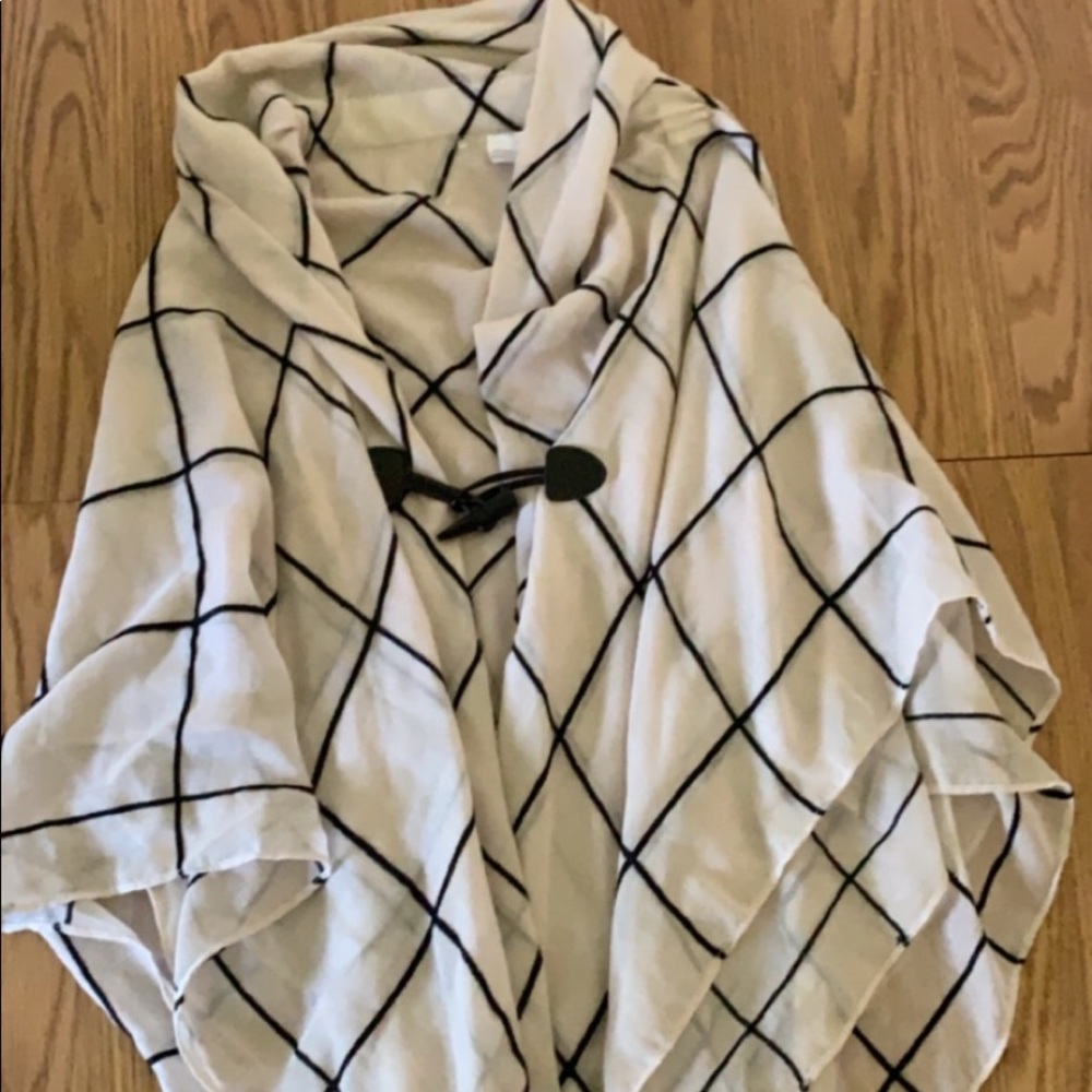 White and black large checkered poncho